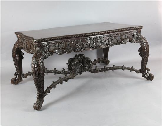 A 19th century Burmese hardwood centre or library table, W.5ft 10in. D.3ft 8in. H.2ft 6in.